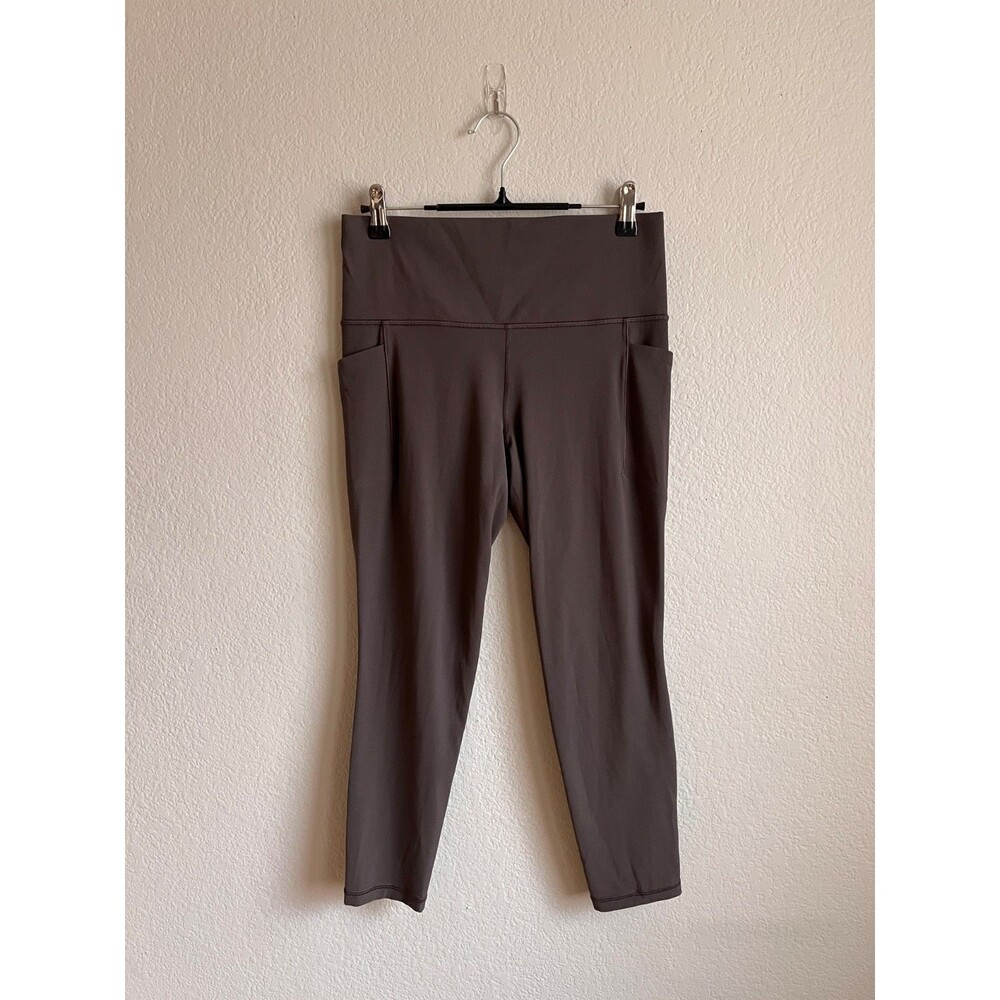 Athleta Salutation Stash High Rise 7/8 Tight in Ash (Charcoal) Size MEDIUM